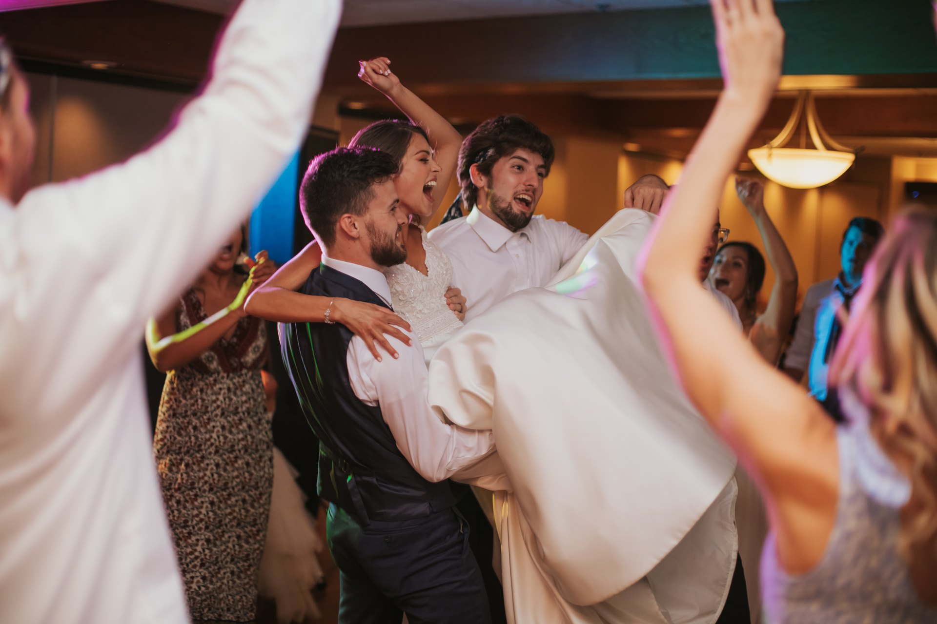 Bride and groom celebrating with guests — One Idea Entertainment