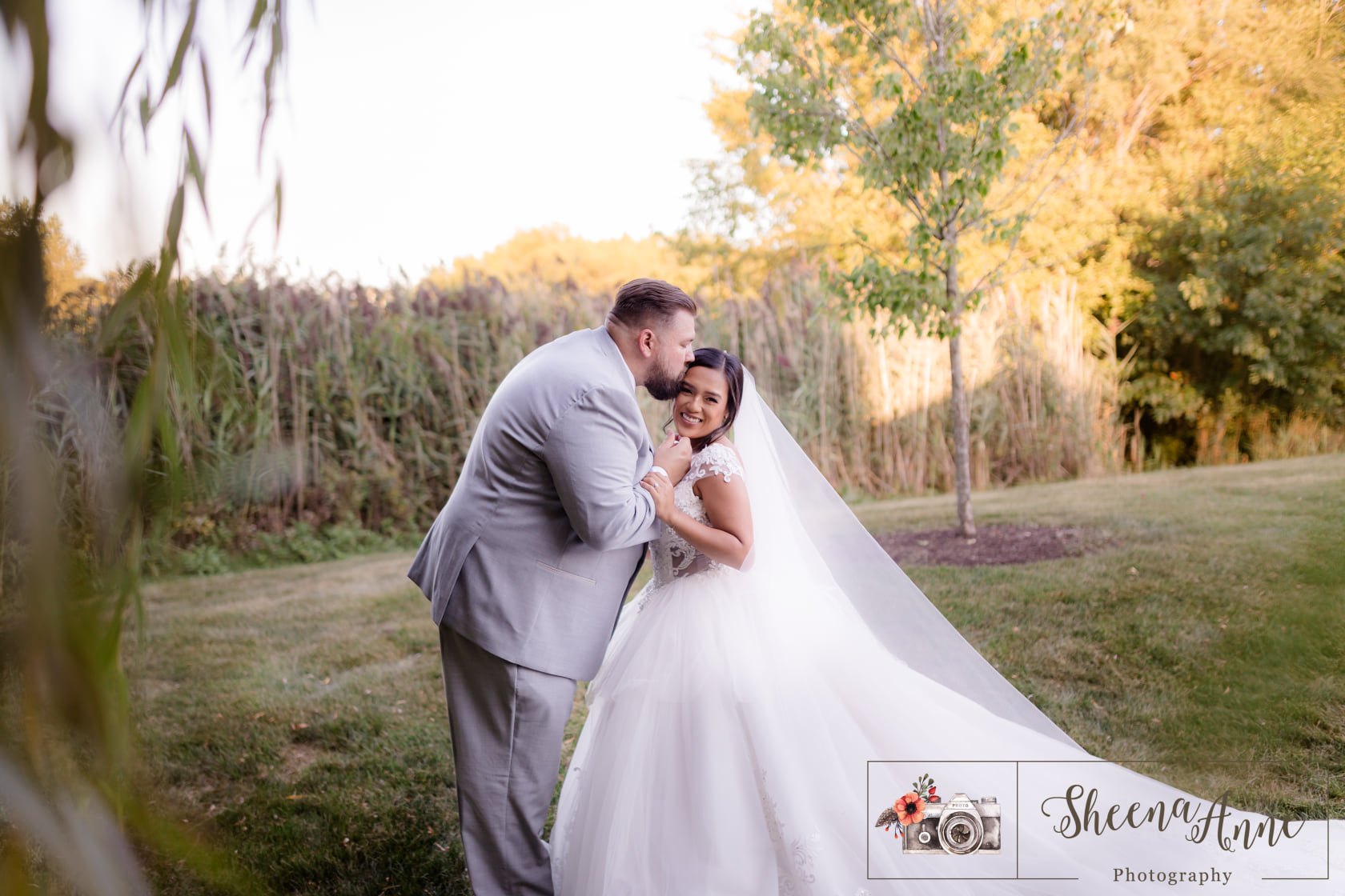 Newlyweds embracing outdoors — One Idea Entertainment