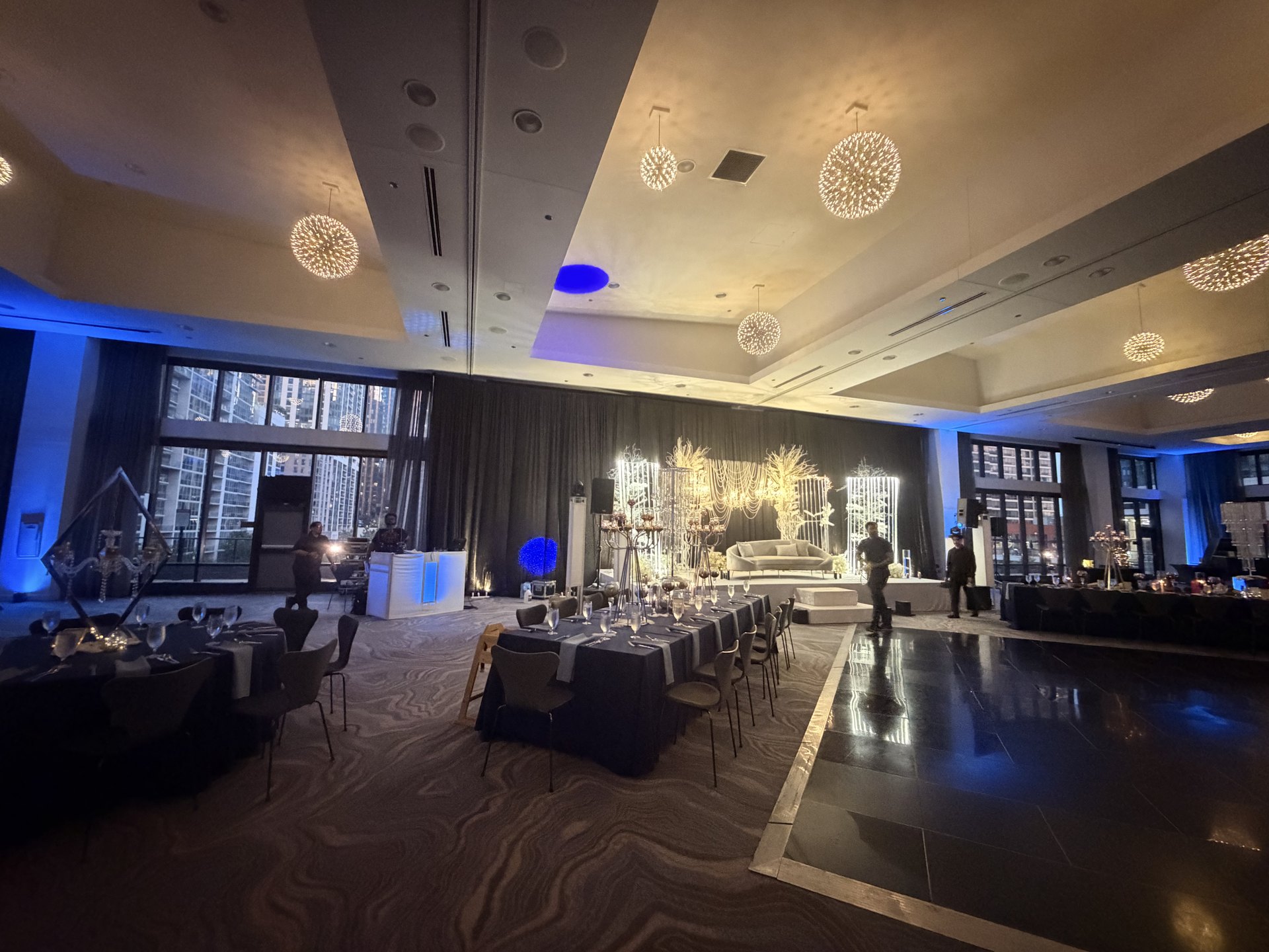 Reception room with blue architectural uplighting — One Idea Entertainment