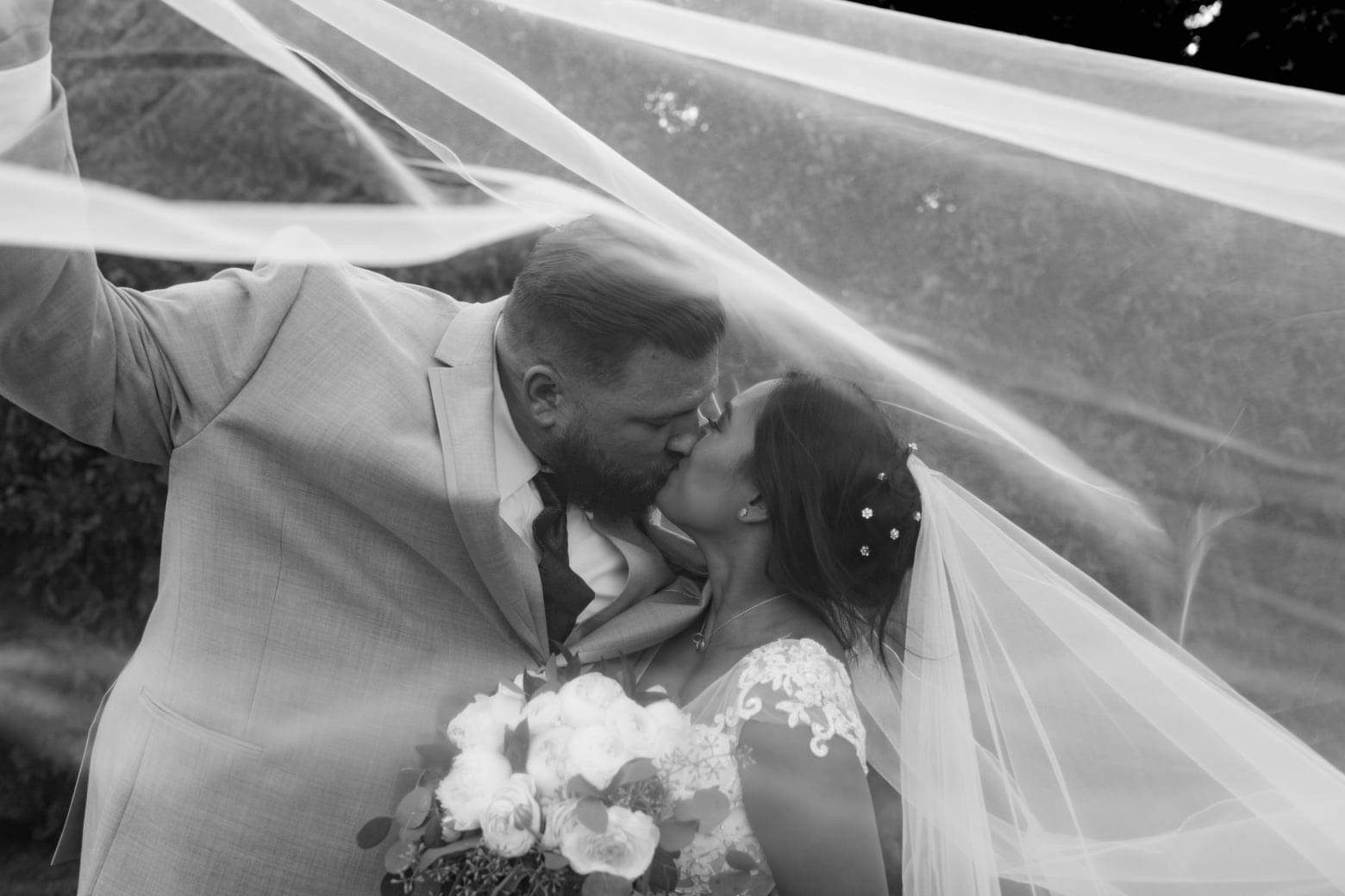 Black-and-white wedding portrait under the veil — One Idea Entertainment