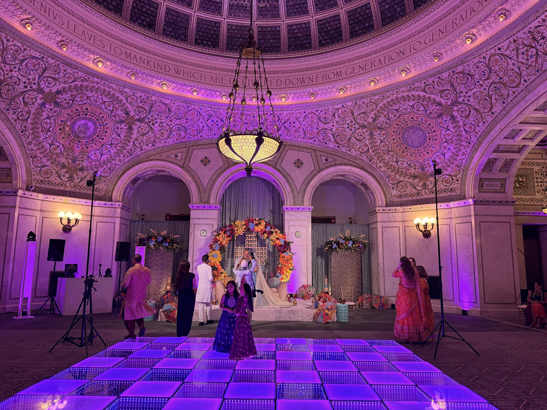 Purple uplighting in an elegant ballroom — One Idea Entertainment