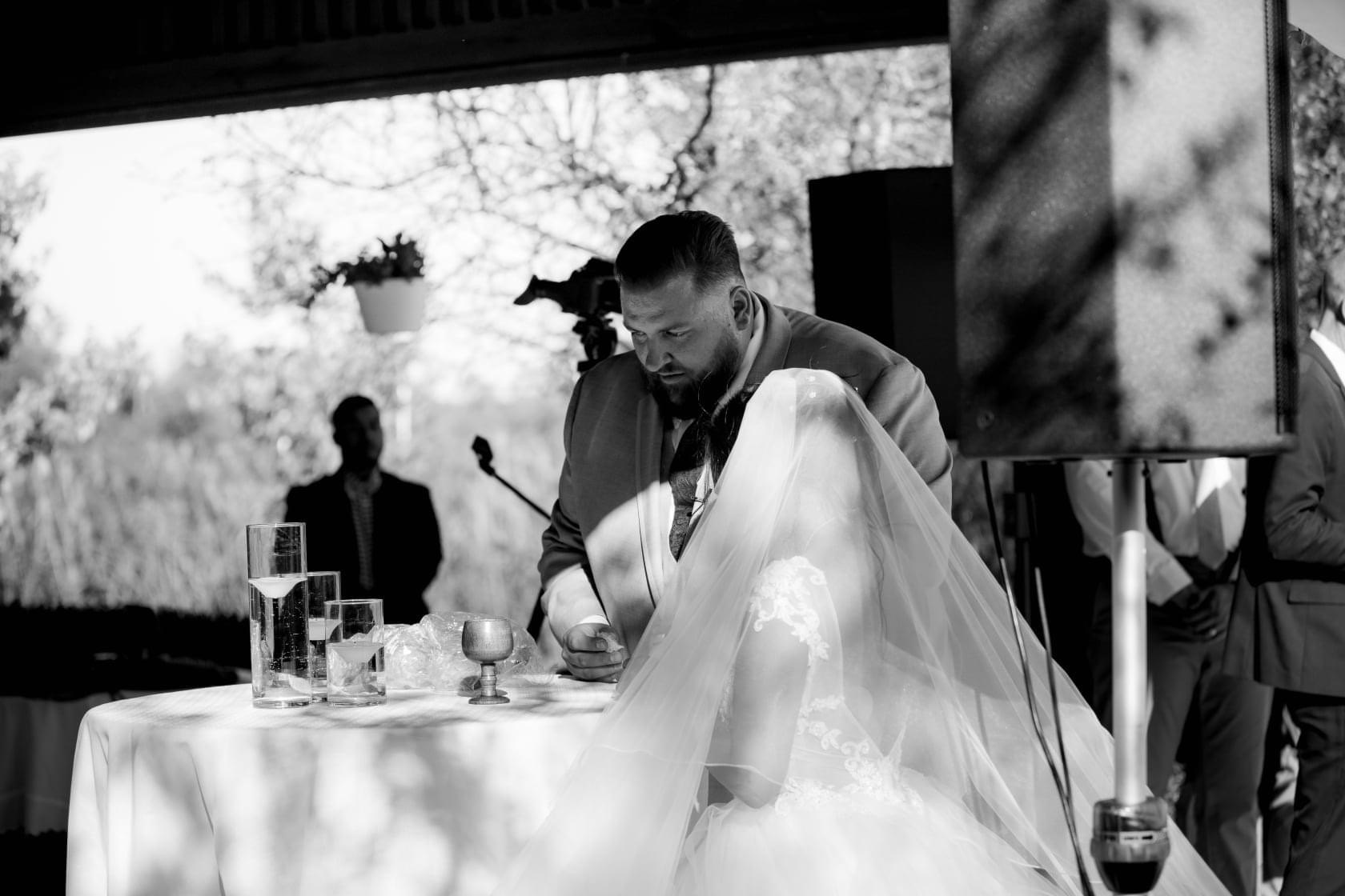 Black-and-white wedding ceremony photo — One Idea Entertainment