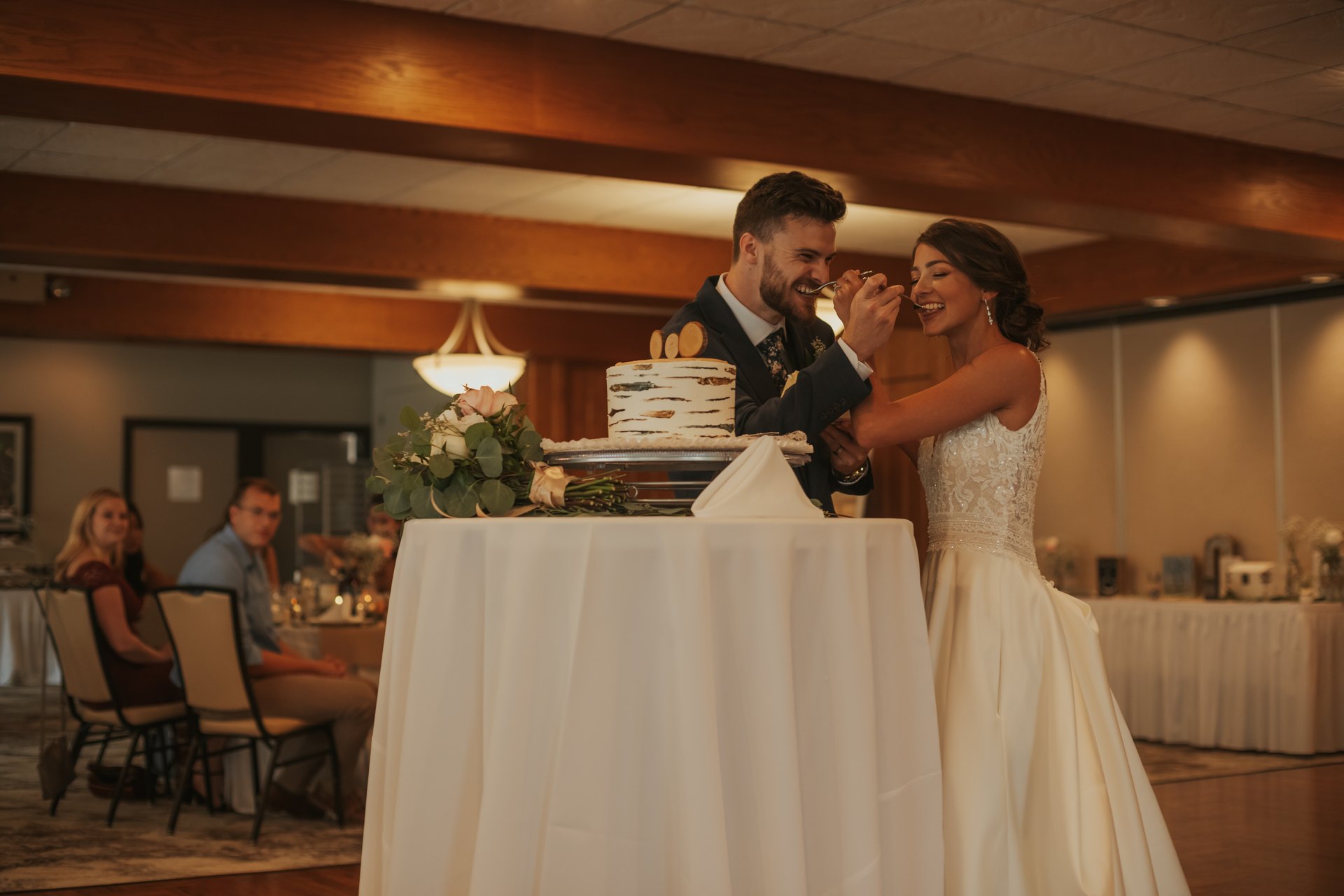 Bride and groom cutting their wedding cake — One Idea Entertainment